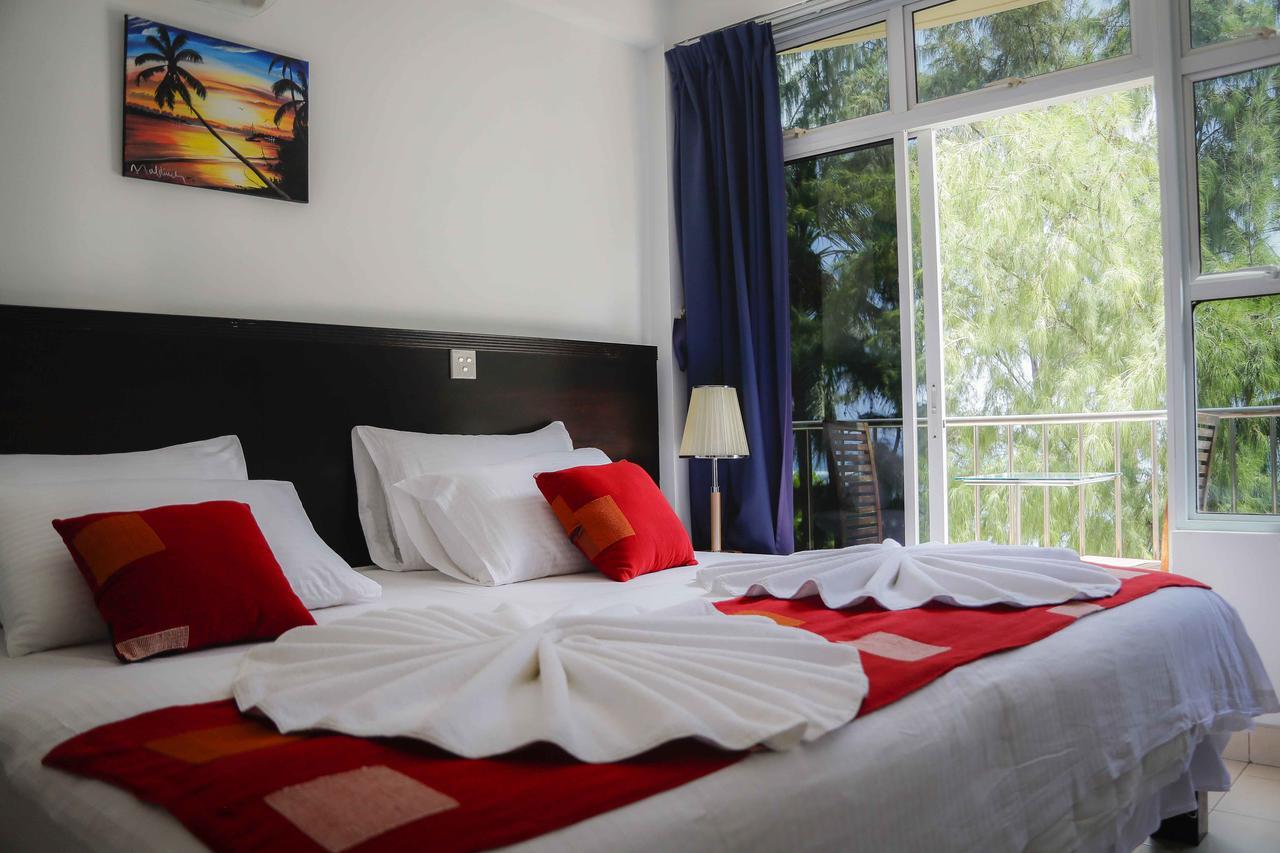 Sunny Suites Inn Хулхумале Экстерьер фото