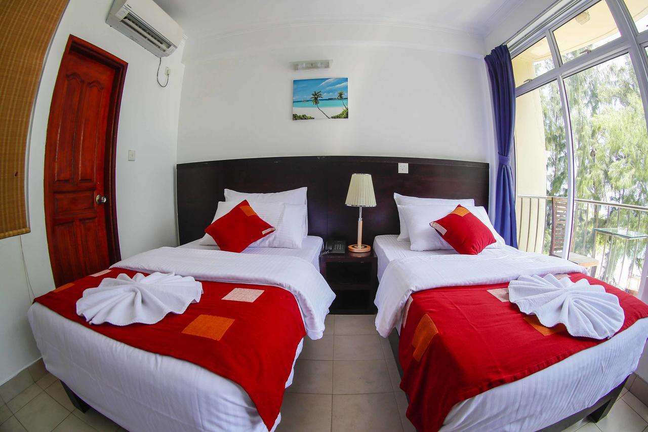 Sunny Suites Inn Хулхумале Экстерьер фото