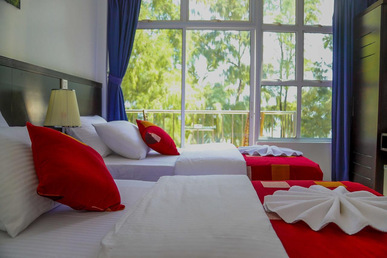 Sunny Suites Inn Хулхумале Экстерьер фото