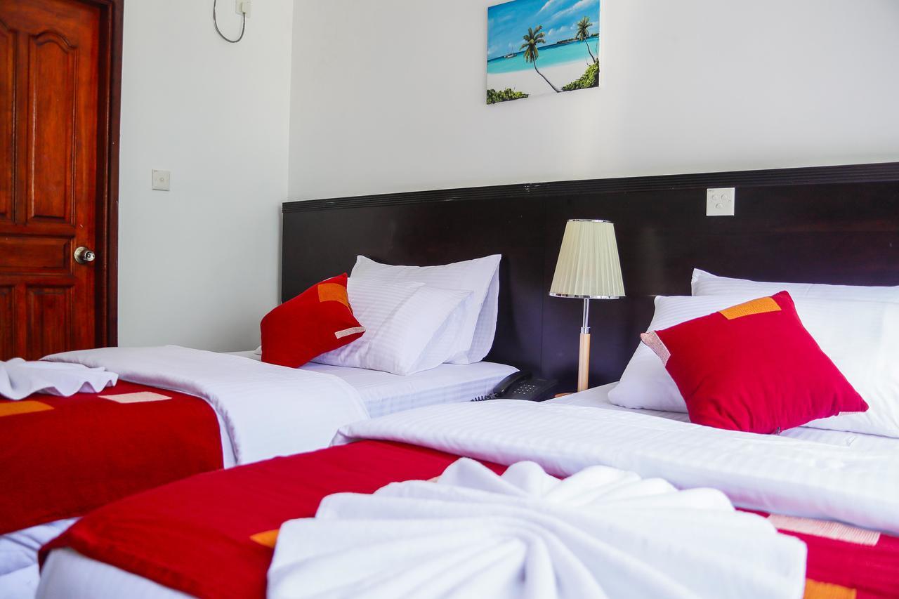 Sunny Suites Inn Хулхумале Экстерьер фото