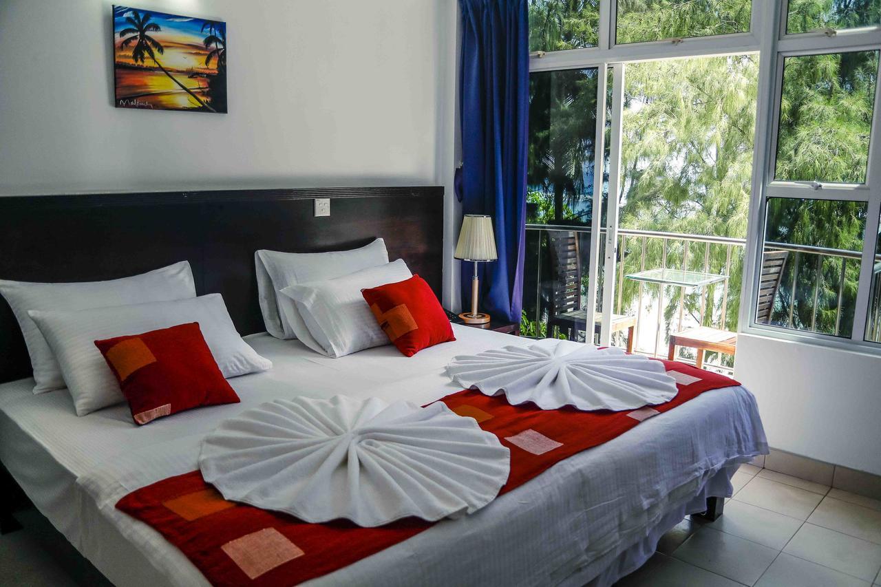 Sunny Suites Inn Хулхумале Экстерьер фото