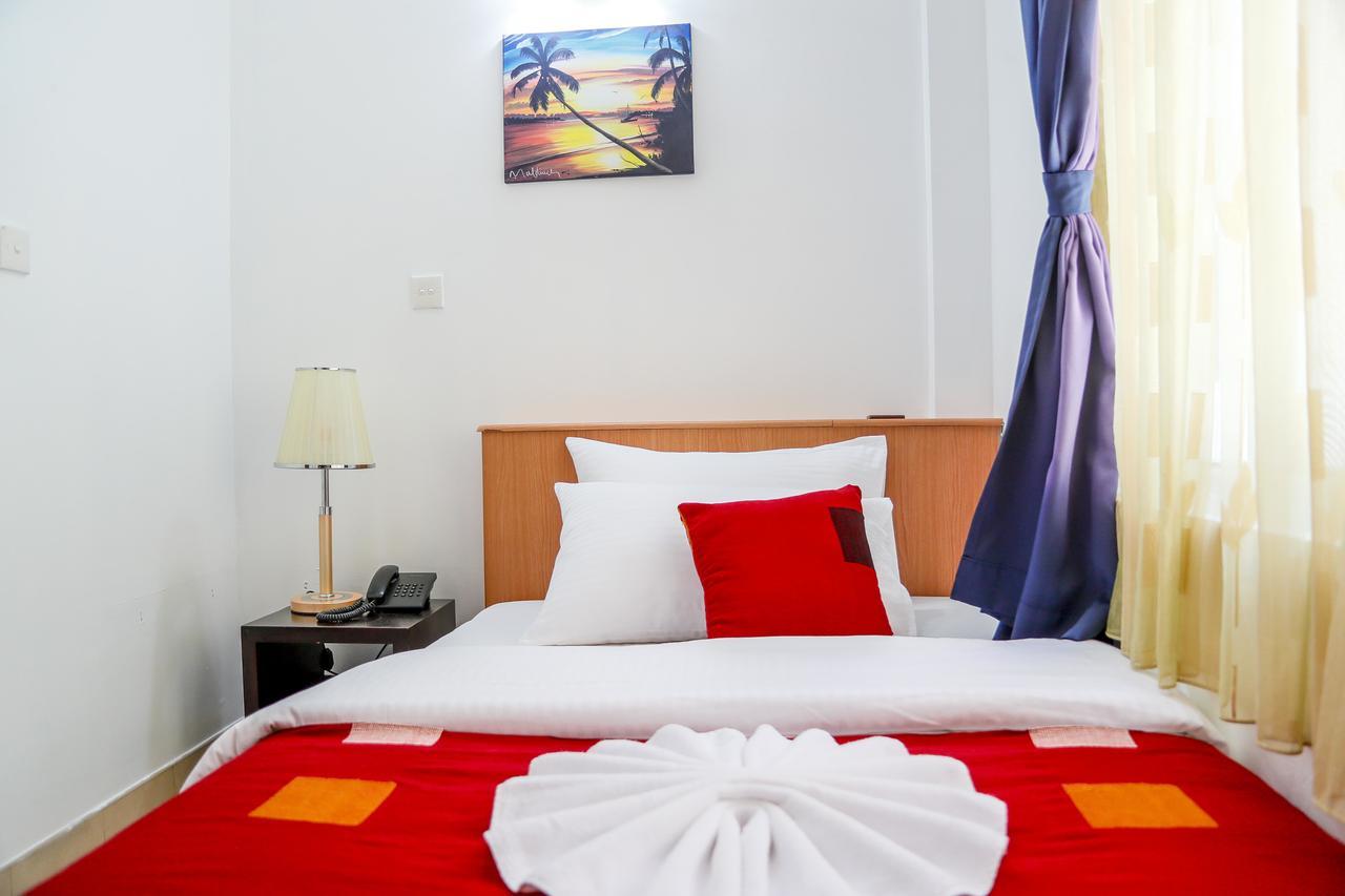 Sunny Suites Inn Хулхумале Экстерьер фото