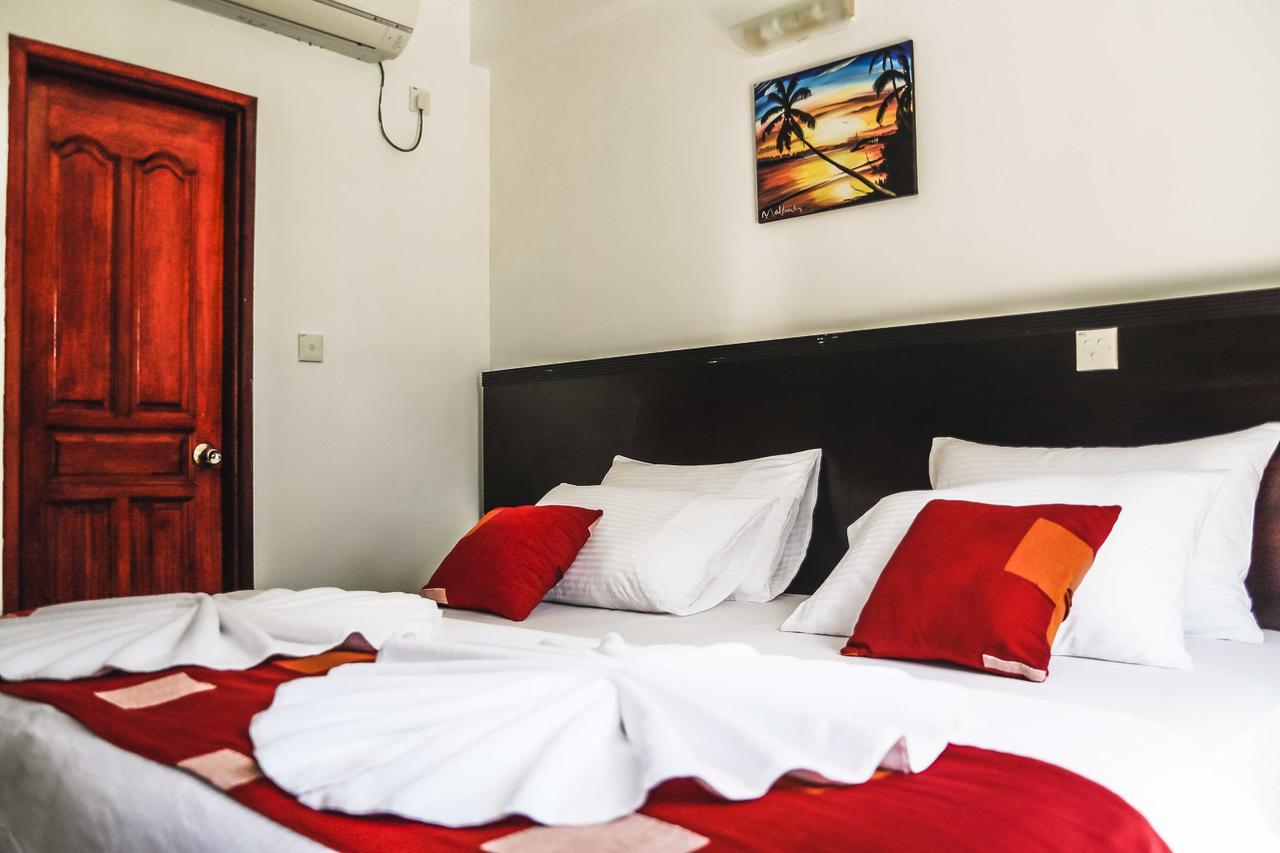 Sunny Suites Inn Хулхумале Экстерьер фото