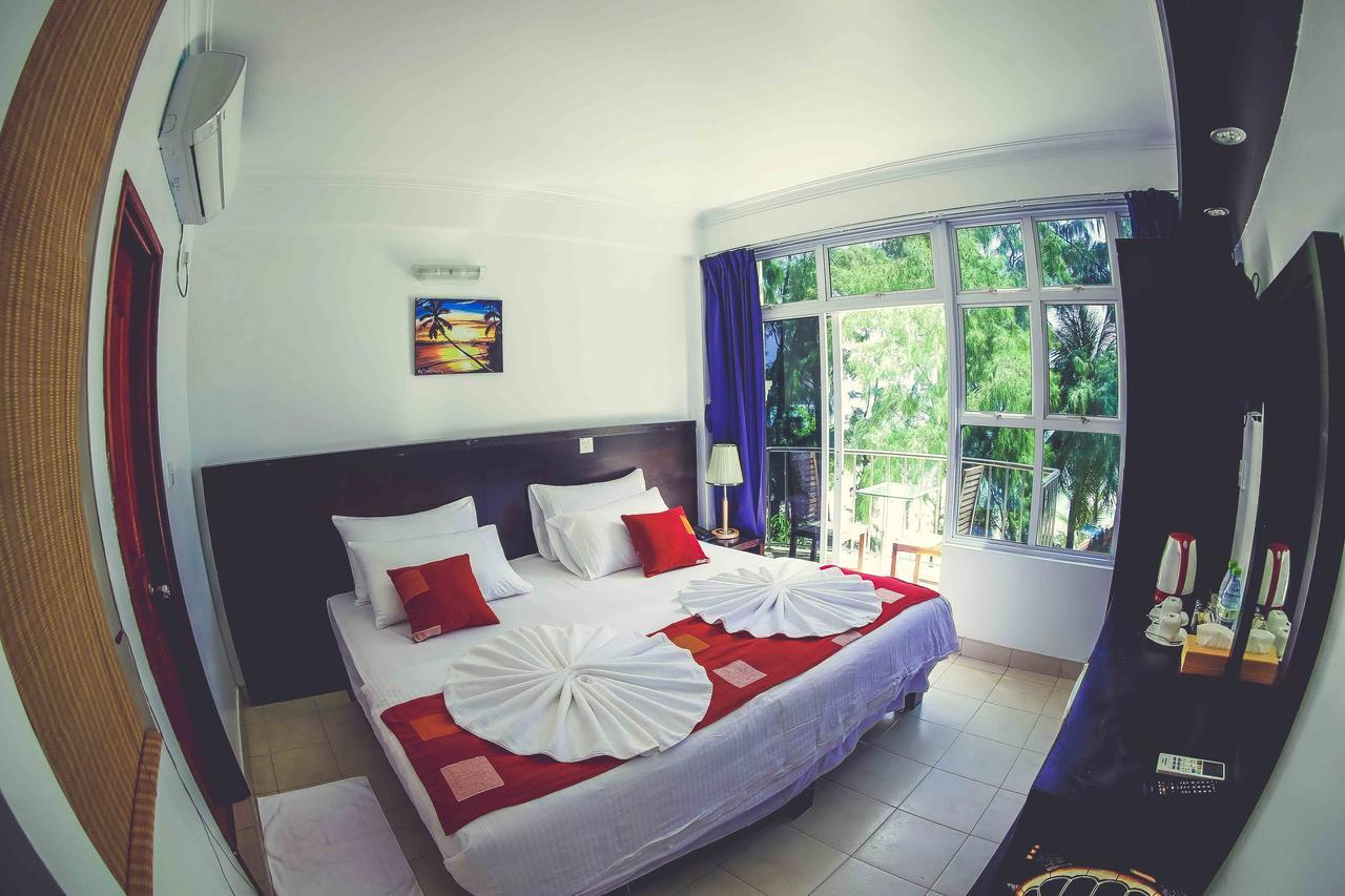 Sunny Suites Inn Хулхумале Экстерьер фото