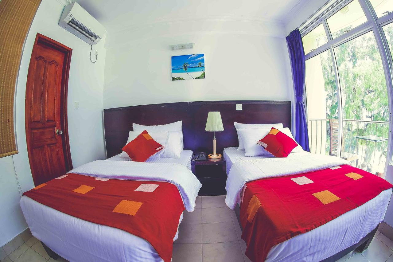 Sunny Suites Inn Хулхумале Экстерьер фото