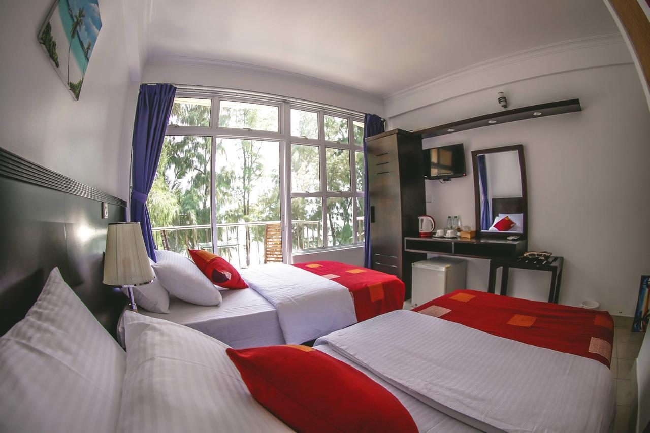 Sunny Suites Inn Хулхумале Экстерьер фото